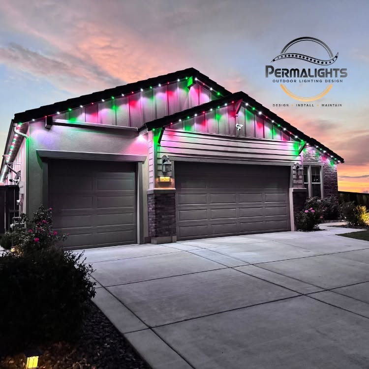 Home with pink and green permanent lighting at sunset